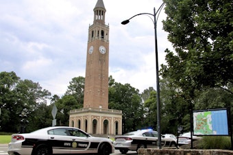caption: Law enforcement respond to the University of North Carolina at Chapel Hill campus on Monday after the university locked down and warned of an armed person on campus.