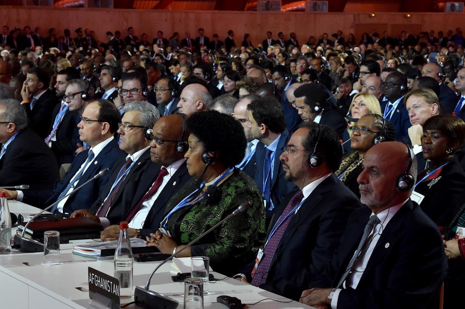 caption: World leaders at the COP 21 in Paris, France. 