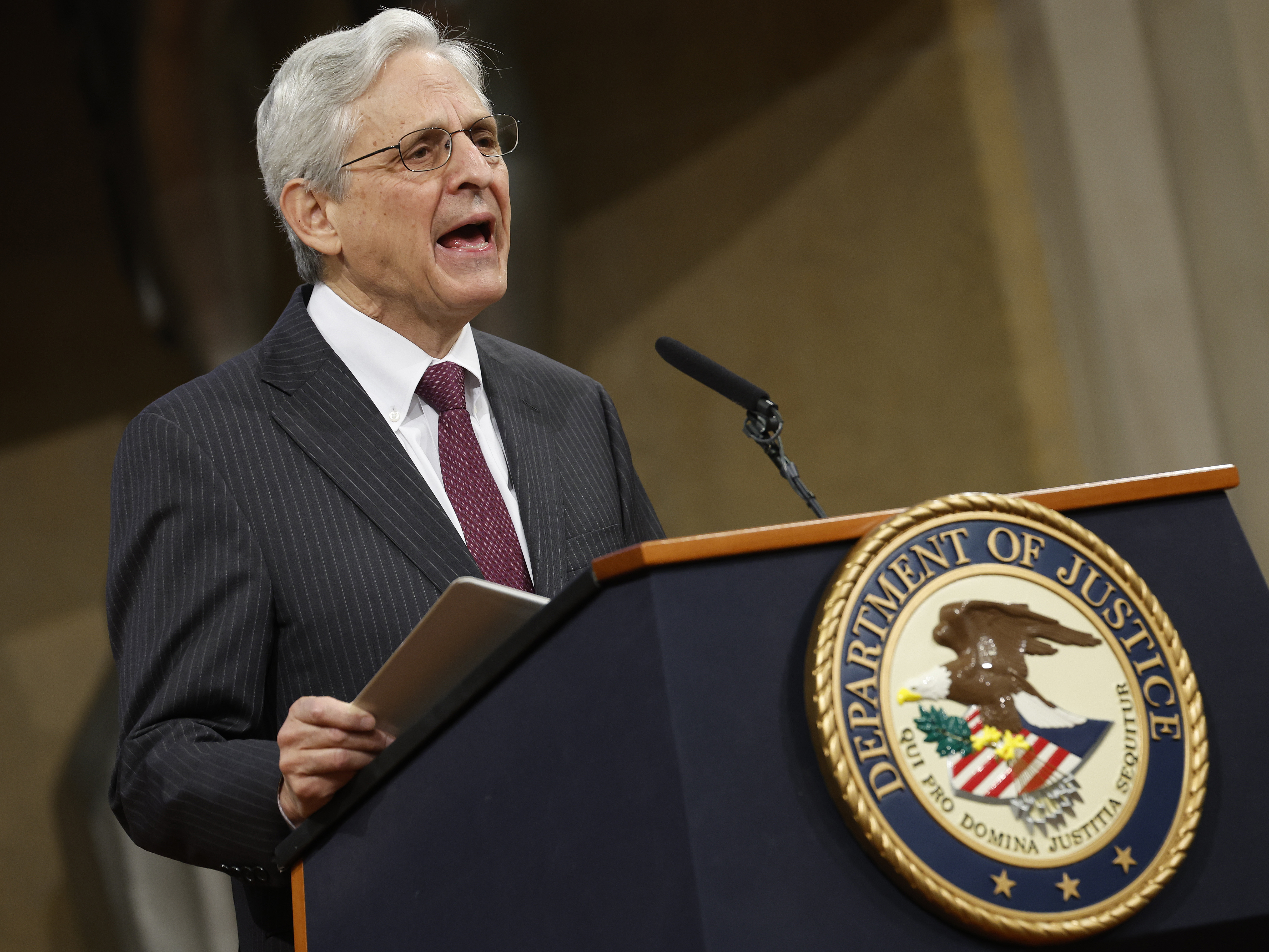caption: U.S. Attorney General Merrick Garland said that the Justice Department's new use of force policy reflects the consensus views of law enforcement leadership groups and union associations.