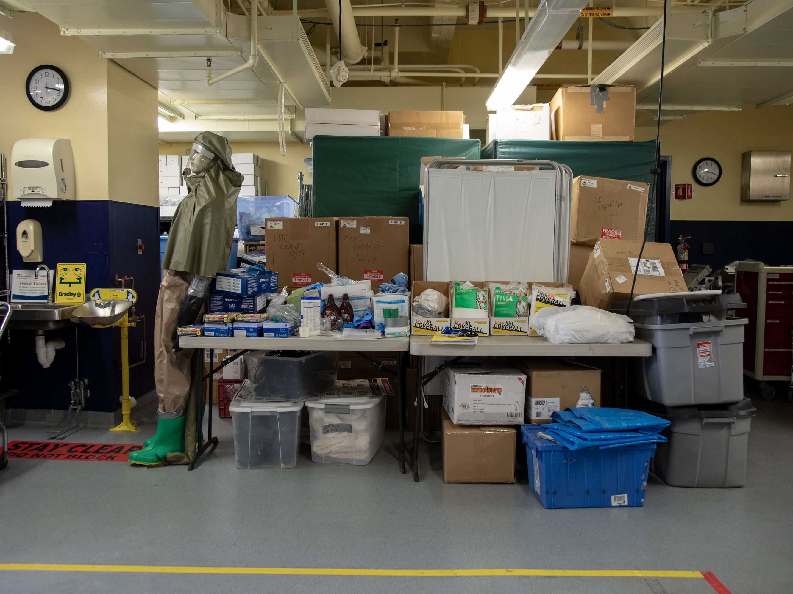 caption: MedStar Washington Hospital Center's "ready room" in Washington, D.C., has mostly been used to house emergency supplies — but some storage carts have been moved out to make way for patient assessment stations.