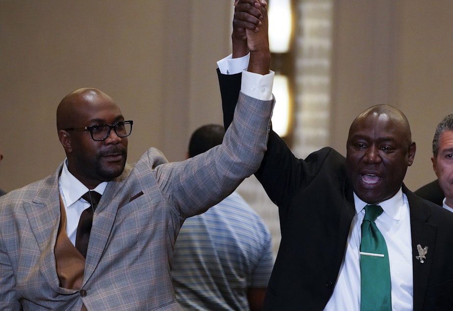 caption: Philonise Floyd (left) and attorney Ben Crump react after a guilty verdict was announced at the trial of former Minneapolis police Officer Derek Chauvin for the murder of Floyd's brother George Floyd
