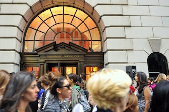 caption: Customers line up to enter the Bergdorf Goodman store in New York City in this 2010 file photo. Advice columnist E. Jean Carroll claims President Trump sexually assaulted her in a dressing room at the Manhattan department store in the '90s.