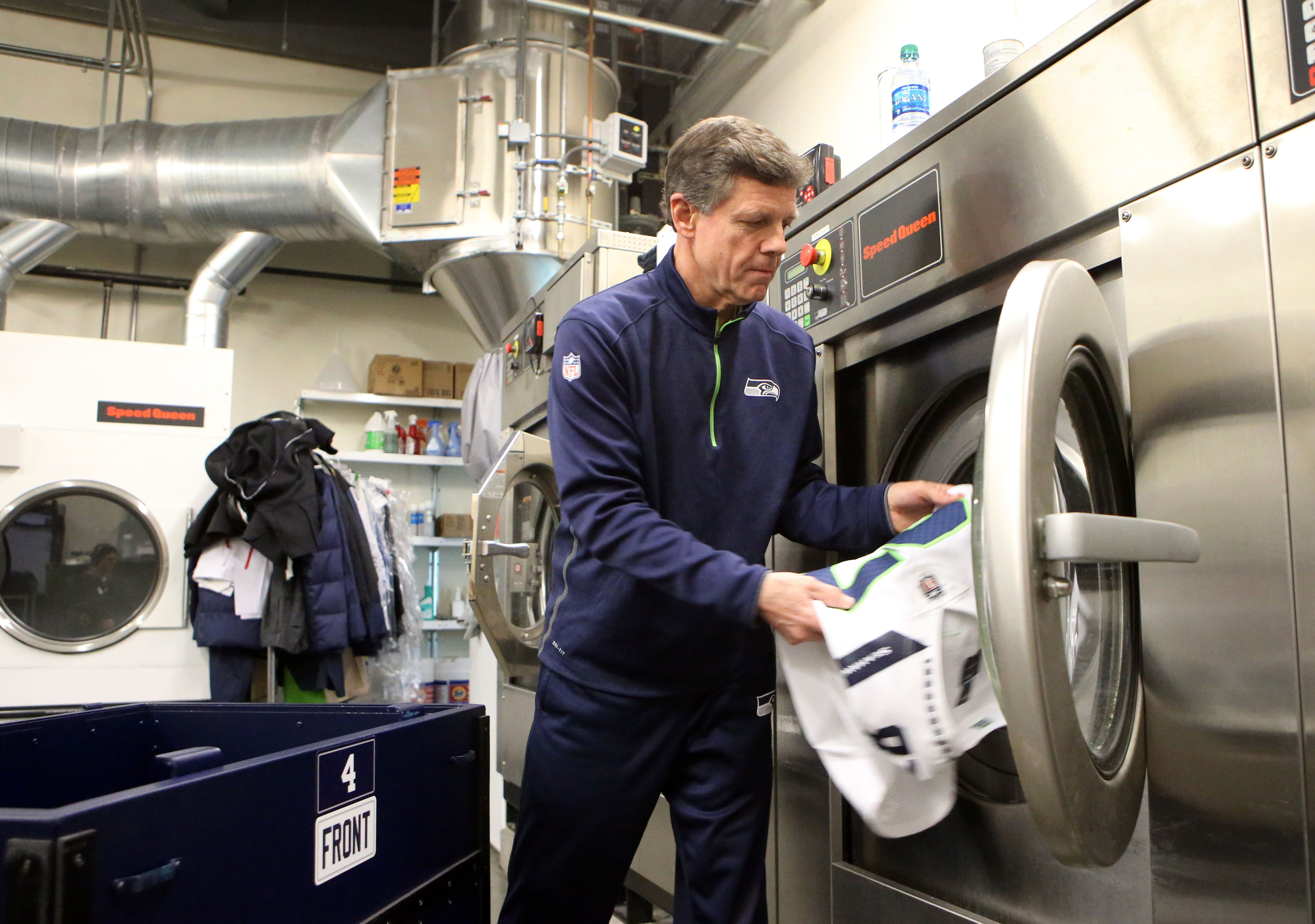 caption: Rick Duchaine is the Seattle Seahawks' "Jersey Whisperer"