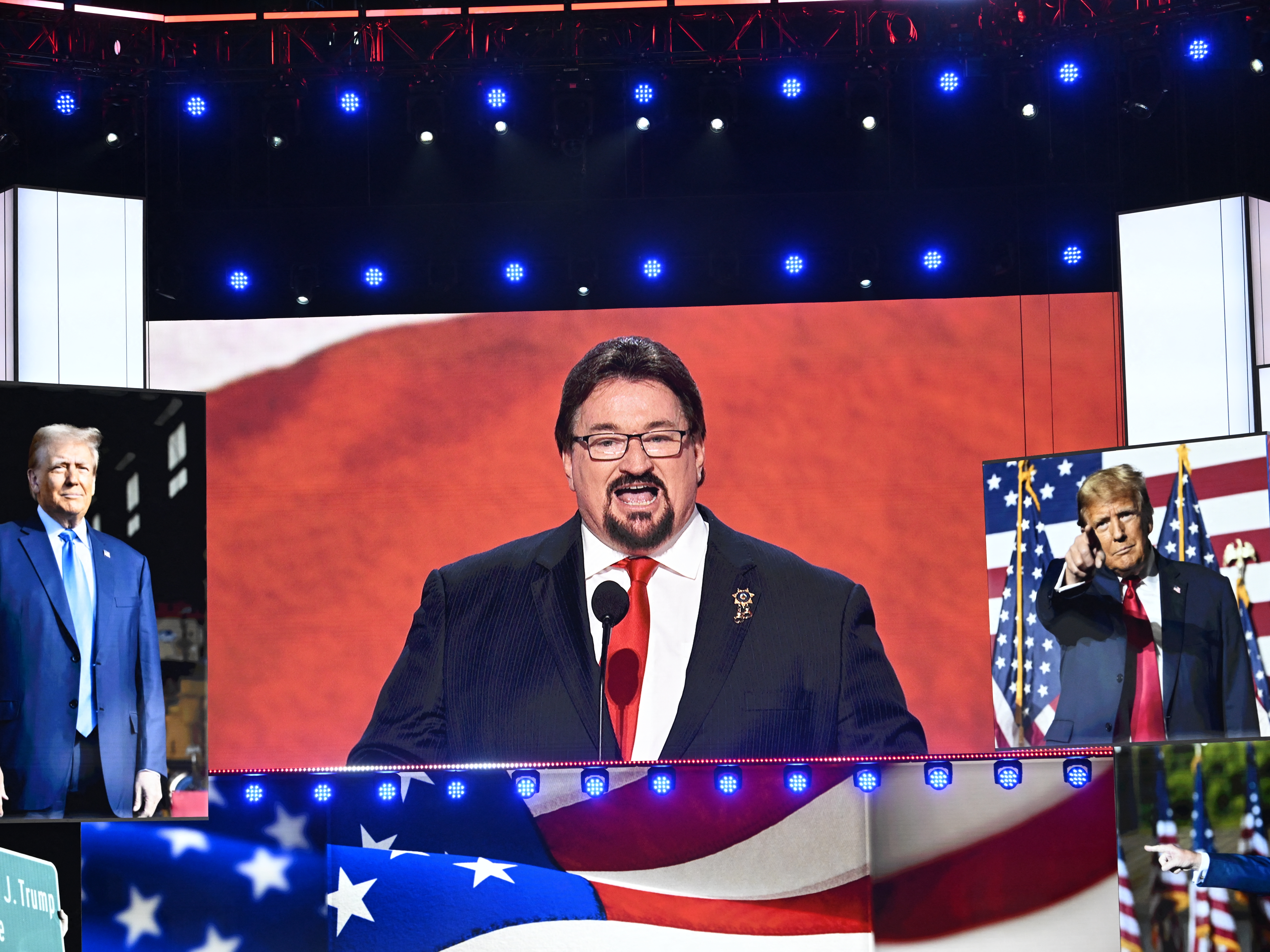 caption: Nevada Republican Party Chair Michael McDonald, one of the 2024 presidential electors facing felony charges related to the 2020 "fake electors" scheme, speaks during the Republican National Convention at the Fiserv Forum in Milwaukee in July.