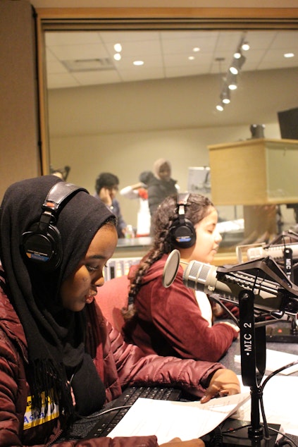 caption: Coalition for Refugees from Burma participants Asha Ahmed and Fatema Metwally in the KUOW recording studio.