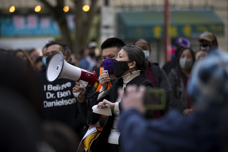 caption: Sharon Tomiko Santos, a member of the Washington House of Representatives for the 37th legislative district, speaks to the crowd with a megaphone during the 'We Are Not Silent' rally against anti-Asian hate and violence on Saturday, March 13, 2021, at Hing Hay Park in Seattle. Several days of actions are planned by rally organizers in the Seattle area following recent attacks and violence against Asian American and Pacific Islander communities.