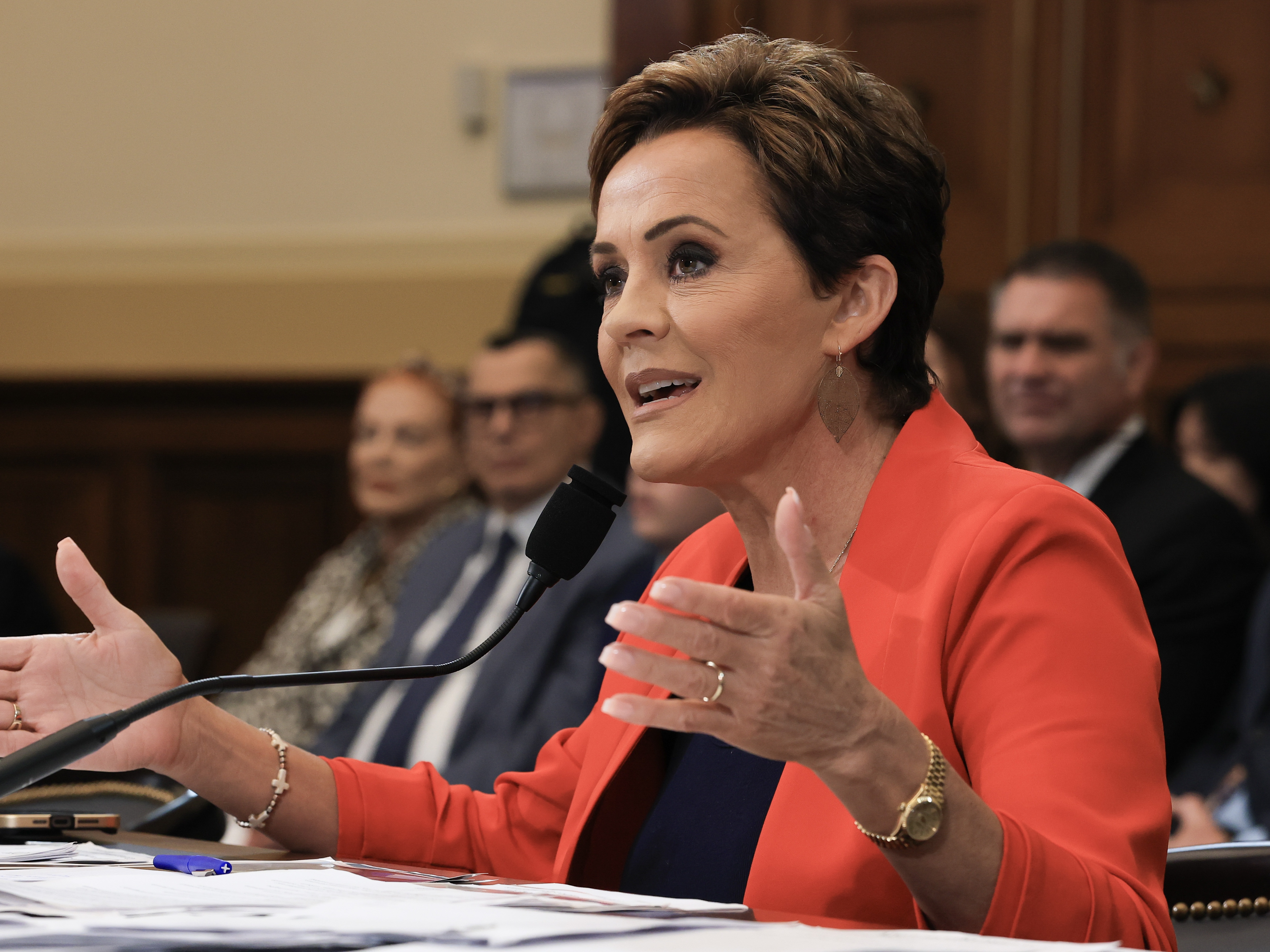 caption: Kari Lake, President Trump's special adviser overseeing the shrinking of the U.S. Agency for Global Media, testifies before the House Committee on Foreign Affairs hearing on June 25, 2025 in Washington, DC.