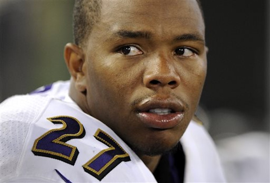 caption: Baltimore Ravens running back Ray Rice sits on the sideline during a preseason game in 2007. Rice was the focus of a domestic violence controversy in 2014.