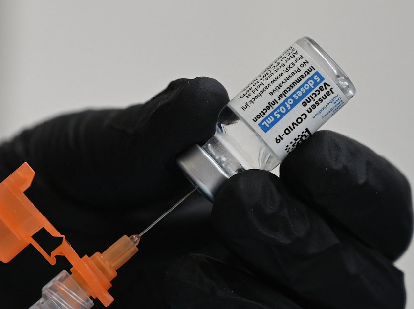 caption: A nurse fills a syringe with Johnson & Johnson's COVID-19 vaccine at a clinic in Pasadena, Calif., on Thursday.