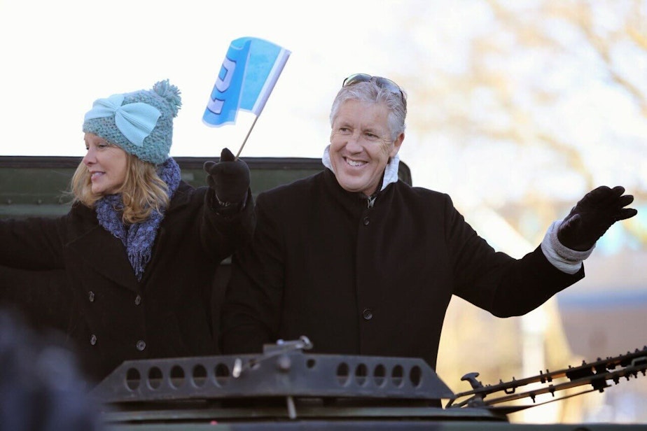 caption: Seahawks coach Pete Carroll and his wife, Glena Goranson, February 5, 2014 during the Super Bowl parade in downtown Seattle.vPete Carroll was the head of the Seattle NFL franchise when they won the Super Bowl XLVIII.