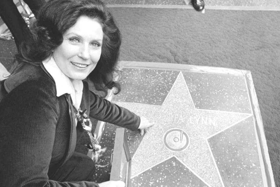 caption: Country music singer Loretta Lynn points to her Hollywood Walk of Fame star during induction ceremonies in Hollywood, Calif., on Feb. 8, 1978. Lynn, the Kentucky coal miner’s daughter who became a pillar of country music, died Tuesday at her home in Hurricane Mills, Tenn. She was 90. 