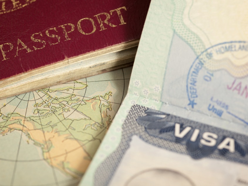 caption: Coronavirus is complicating an already lengthy process for immigrants to the U.S. American consulates and embassies have curtailed operations. And last week President Trump, citing the pandemic, extended a freeze on green cards for new immigrants and suspended certain work visas for foreign workers.