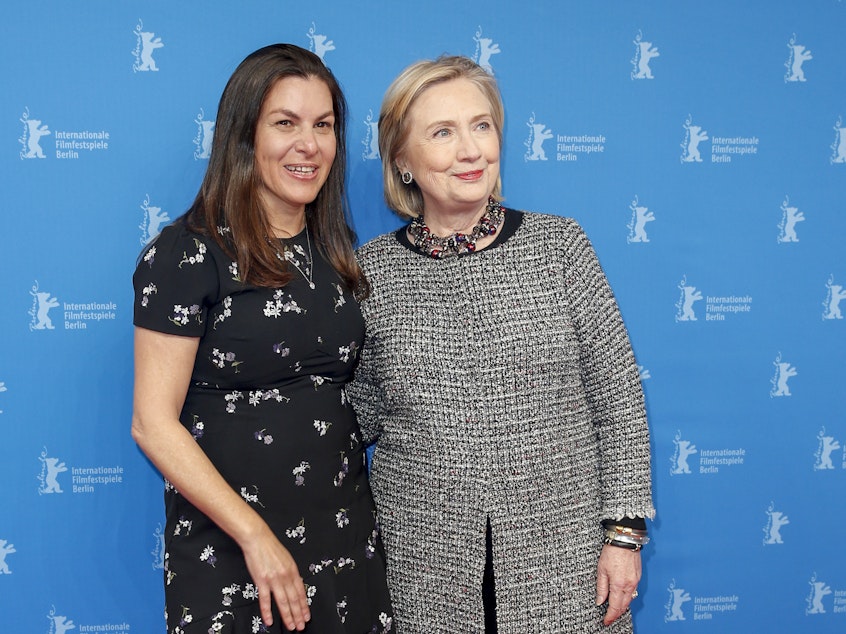 caption: Filmmaker Nanette Burstein and Hillary Clinton pose at the <em>Hillary</em> premiere during the 70th Berlinale International Film Festival on Feb. 24, 2020 in Berlin.