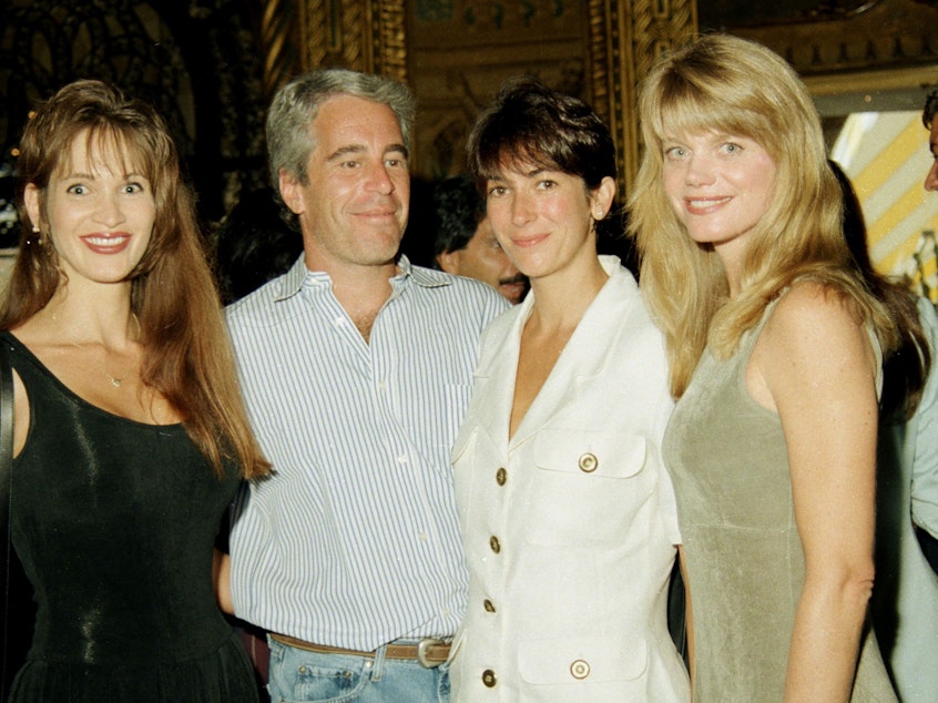 caption: Ghislaine Maxwell, seen here at center right with the disgraced late financier Jeffrey Epstein, gave a deposition in 2016 that should be released, an appeals court says. Maxwell is seen here with Epstein and others a party at the Mar-a-Lago club in Palm Beach.