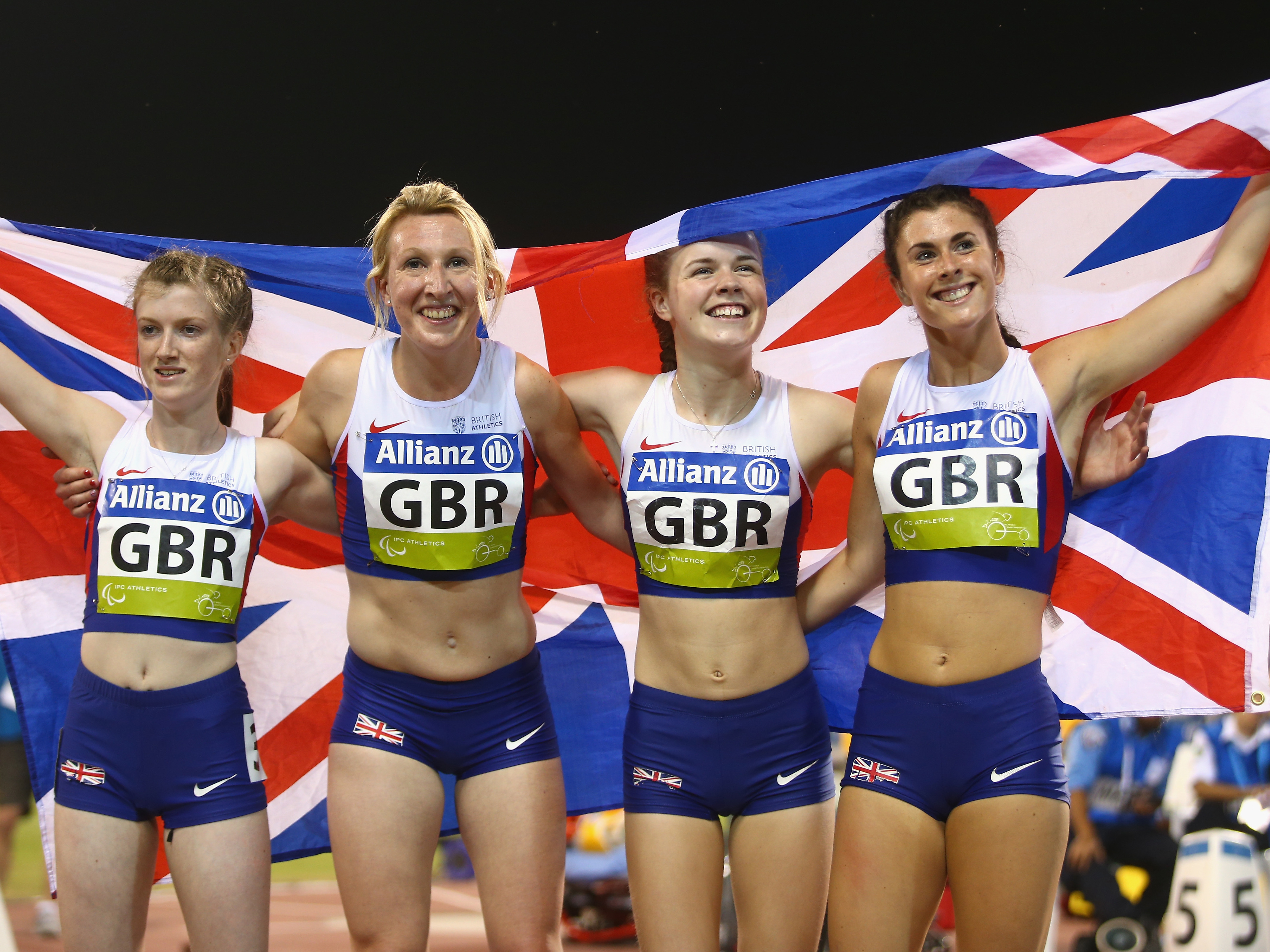 caption: Olivia Breen (right), a Welsh Paralympian seen here in 2015, recently recounted a competition official remarking that her briefs were "too short and inappropriate." Here, she, along with Sophie Hahn (from left), Georgina Hermitage and Maria Lyle of Great Britain, celebrate winning gold in the women's 4x100m T35-38 relay final of the IPC Athletics World Championships in Doha, Qatar, in 2015.