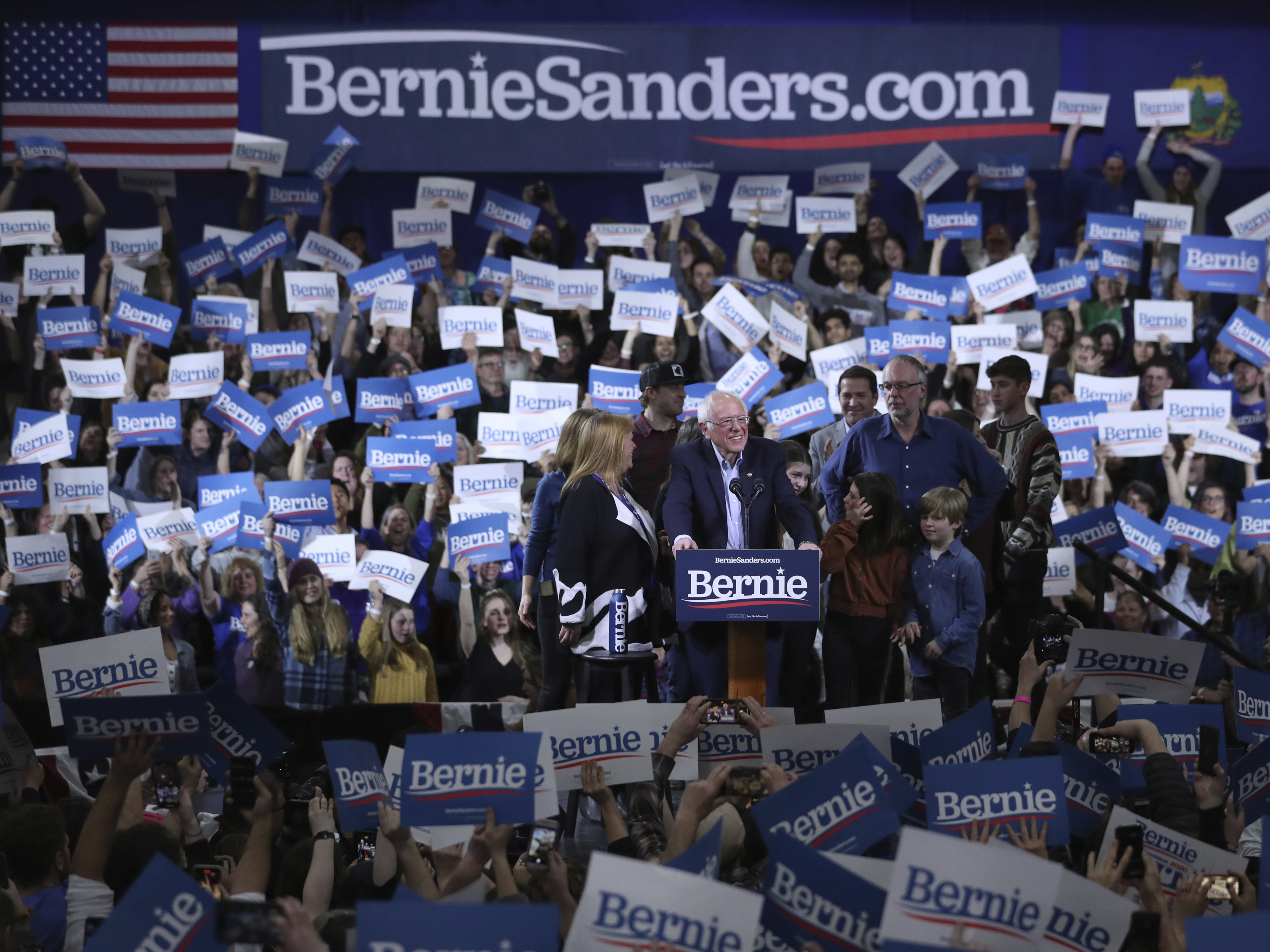 caption: Sen. Bernie Sanders speaks during a primary night election rally in Essex Junction, Vt., on Tuesday.