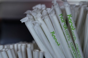 caption: Paper straws sit on the bar at Fog Harbor Fish House in San Francisco, Calif.
