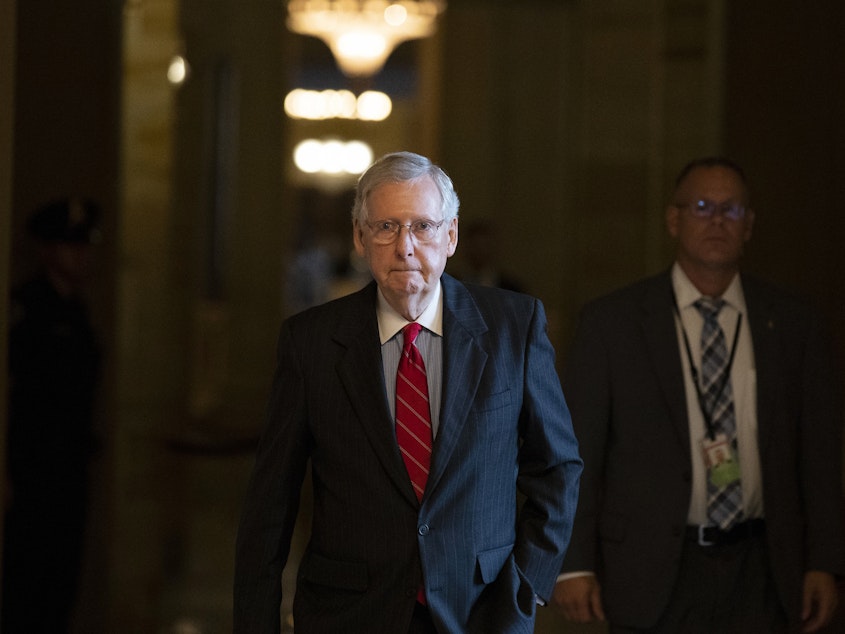 caption: Senate Majority Leader Mitch McConnell of Ky., walks to the Senate floor for a vote, on Capitol Hill, Thursday, Oct. 11, 2018 in Washington.