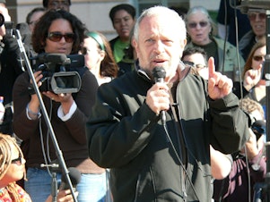 caption: Robert Reich speaks at Occupy LA