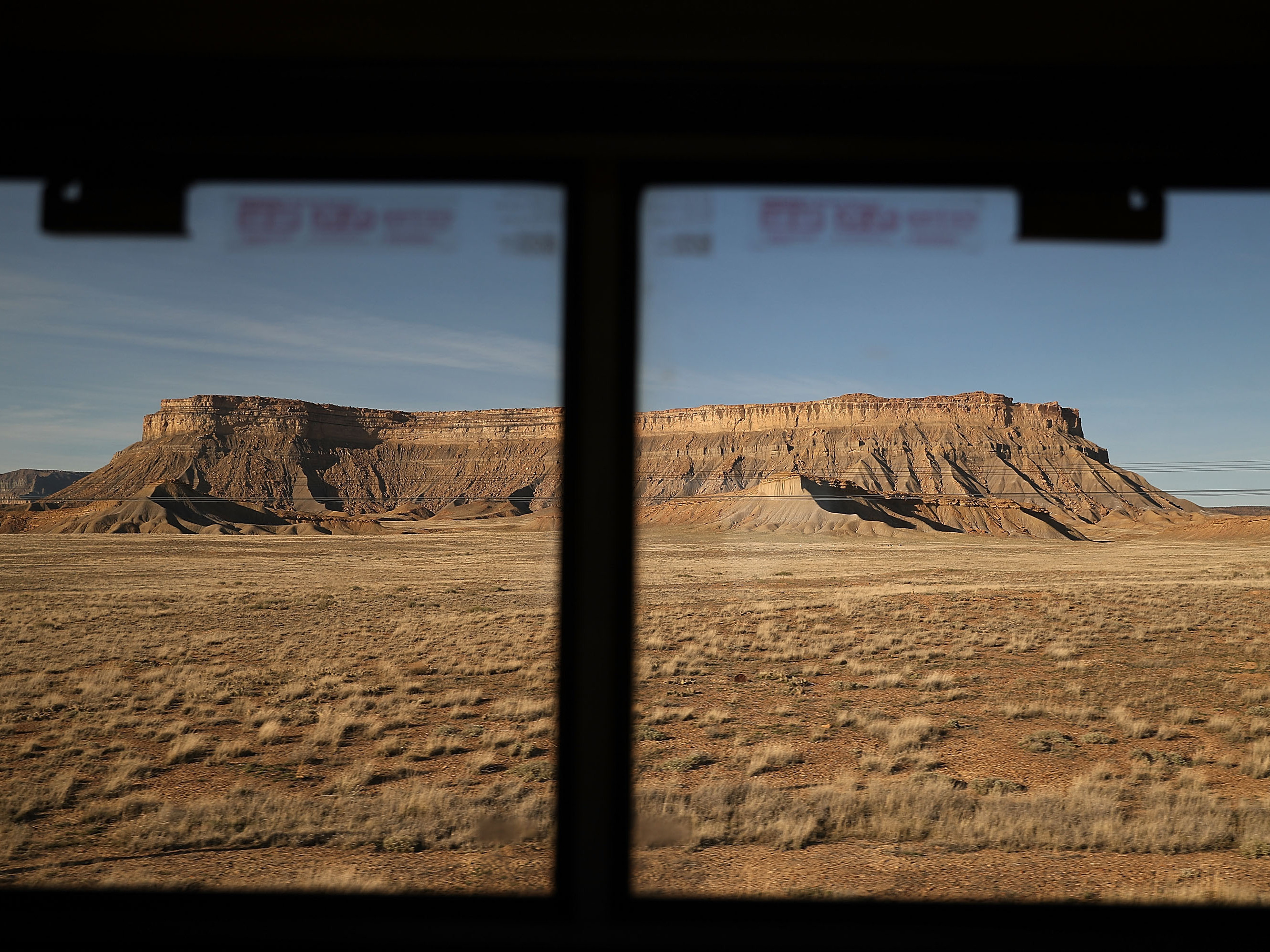 caption: Amtrak's California Zephyr passes a plateau during its 2,438-mile trip to Emeryville/San Francisco from Chicago.