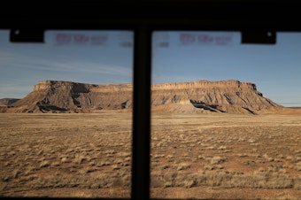 caption: Amtrak's California Zephyr passes a plateau during its 2,438-mile trip to Emeryville/San Francisco from Chicago.