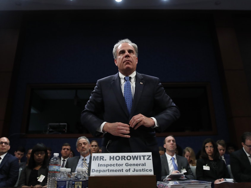 caption: Justice Department Inspector General Michael Horowitz, shown here in 2018, released a report Monday on the 2016 Trump campaign and its links to Russia. He found the FBI was justified in opening the investigation but sharply criticized the way the bureau pursued surveillance warrants against Trump campaign adviser Carter Page.