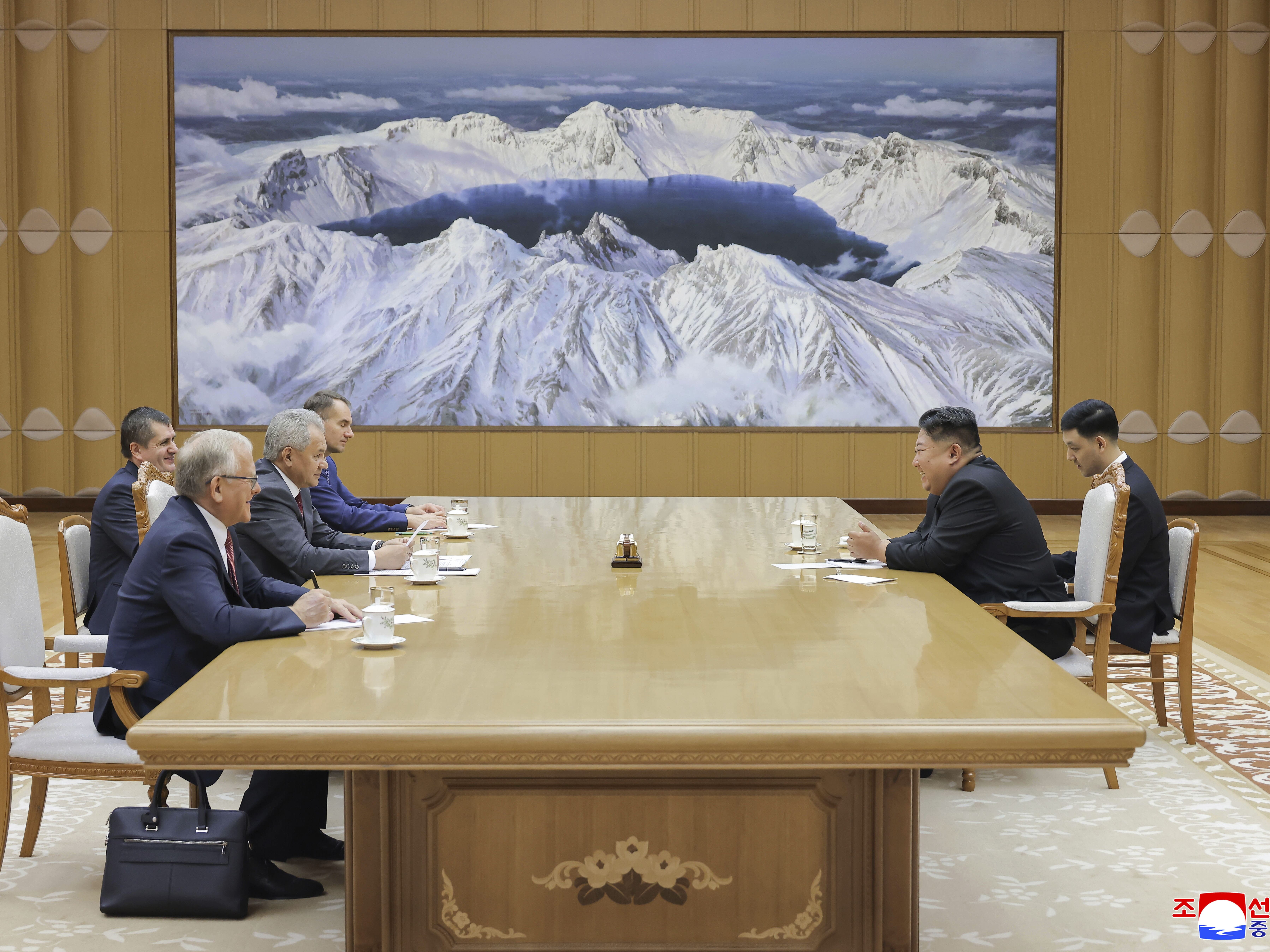 caption: In this photo provided by the North Korean government, Russian Security Council Secretary Sergei Shoigu, third left, meets with North Korean leader Kim Jong Un, second right, at the headquarters of the ruling Workers' Party in Pyongyang, North Korea, Tuesday, June 17, 2025. Independent journalists were not given access to cover the event depicted in this image distributed by the North Korean government. The content of this image is as provided and cannot be independently verified. Korean language watermark 