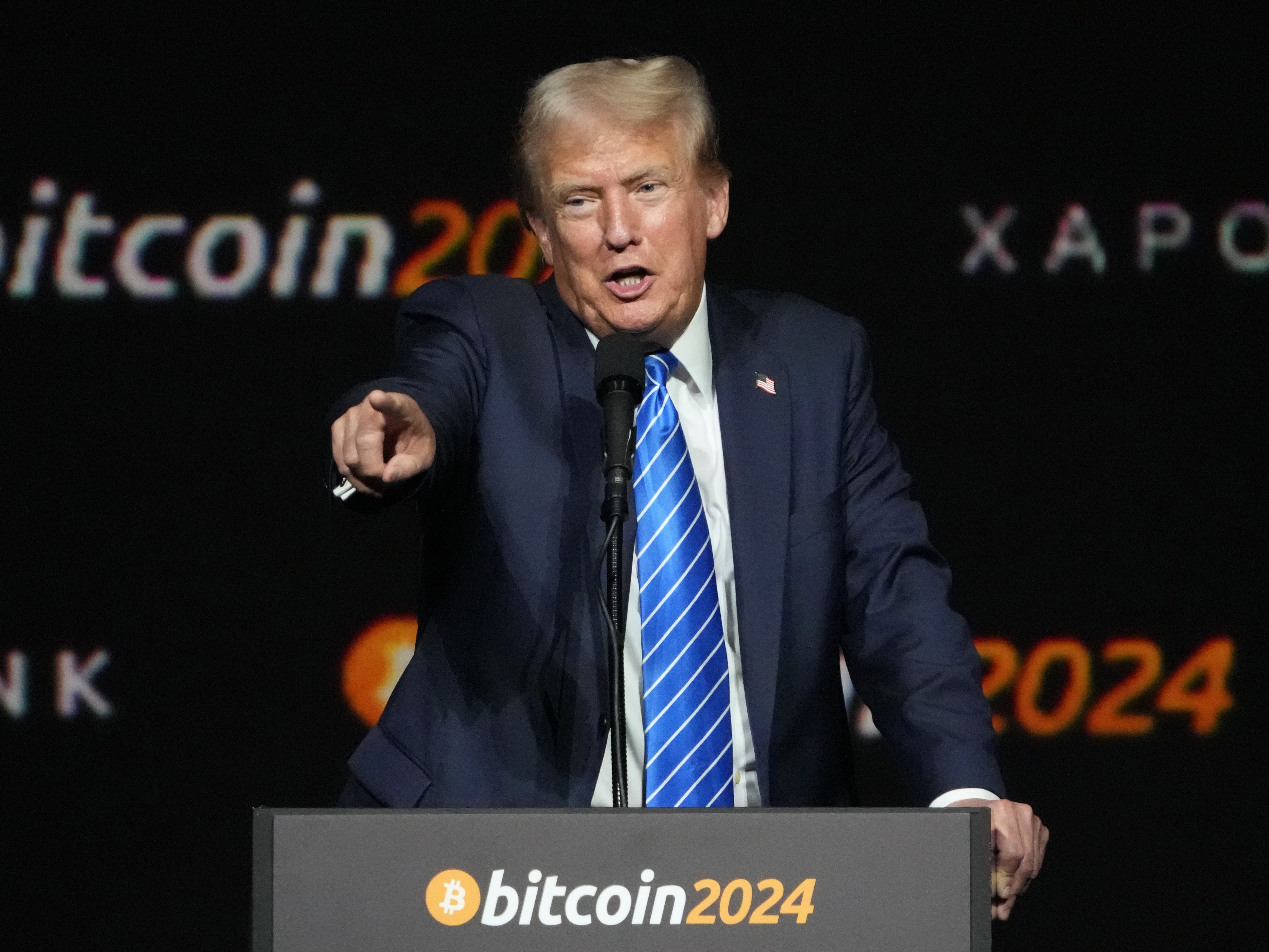caption: President Donald Trump, at the time on the campaign trail seeking reelection, speaks at the Bitcoin 2024 Conference Saturday, July 27, 2024, in Nashville, Tenn.