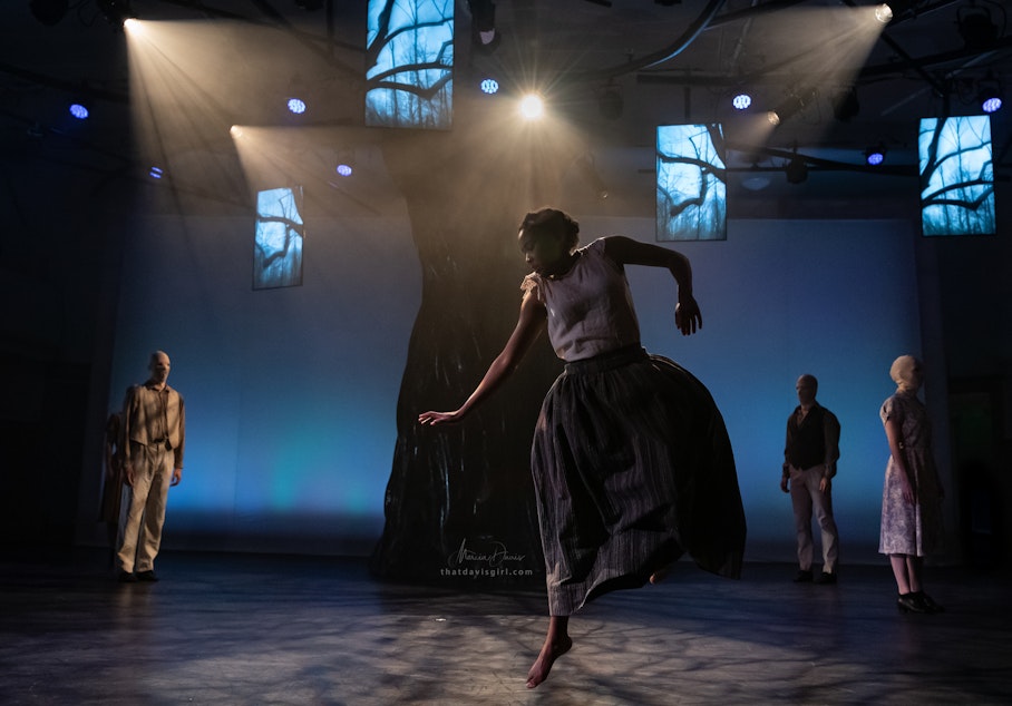 caption: Nia-Amina Minor with Spectrum Dance Theatre company members in Donald Byrd's "Strange Fruit"