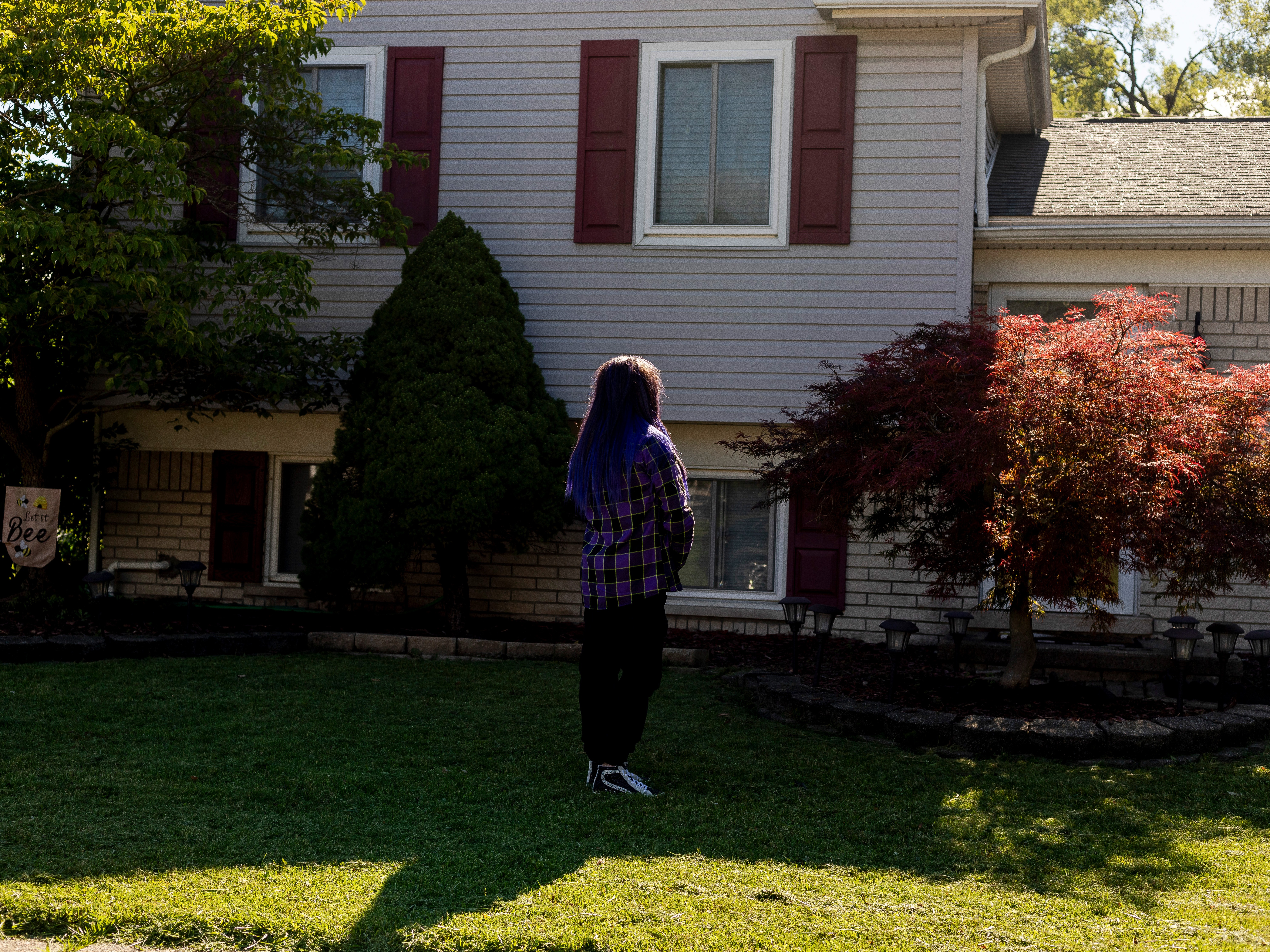 caption: Randee Noggle stands in front of her home in Taylor, Mich. on June 30, 2024. She bought the house in 2018 using money she inherited from her grandmother.