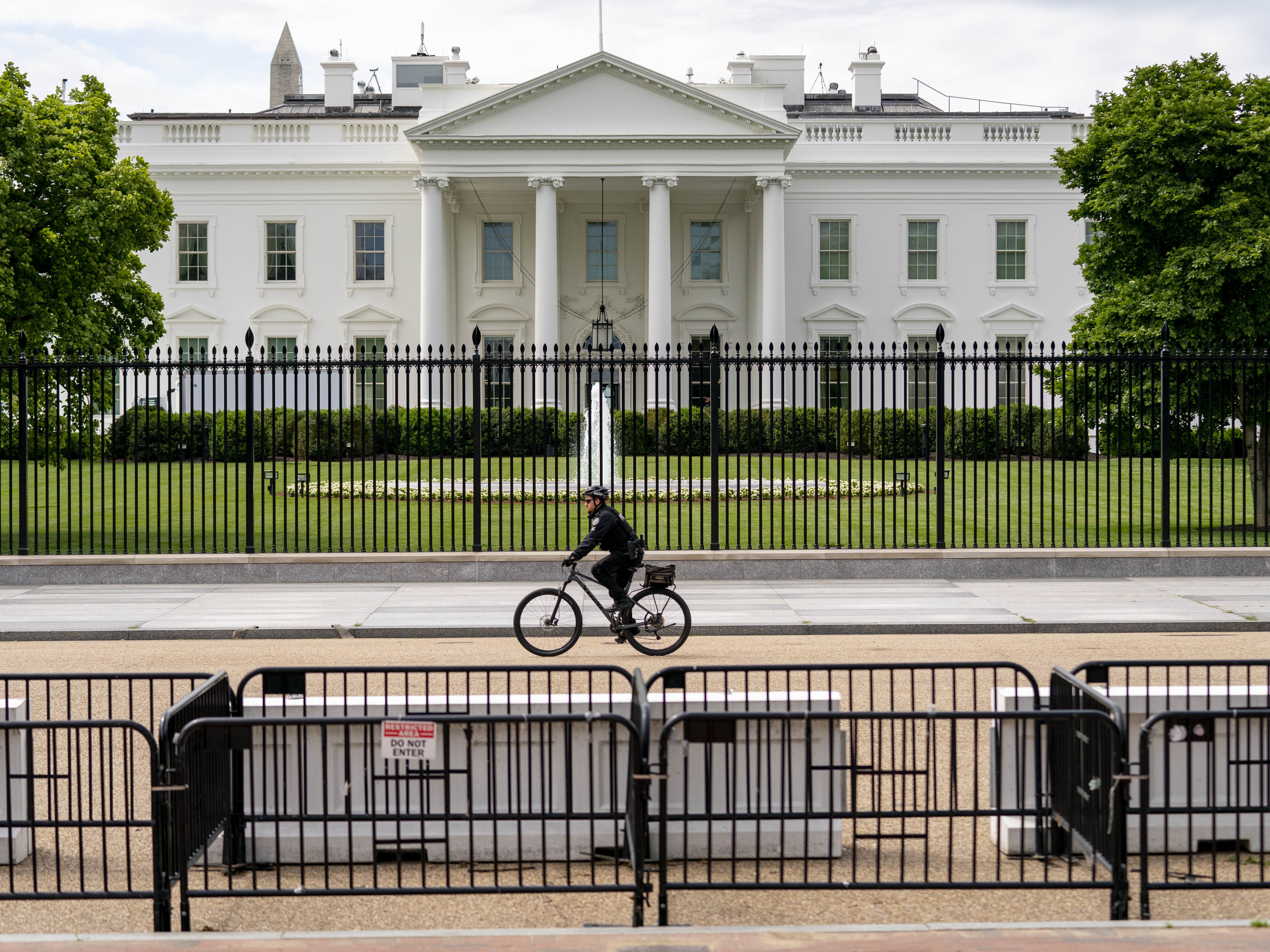 caption: Across the street from the White House, shown here in 2021, is Lafayette Park. On Thursday, a lightning strike there hit four people, and two of them were pronounced dead on Friday.