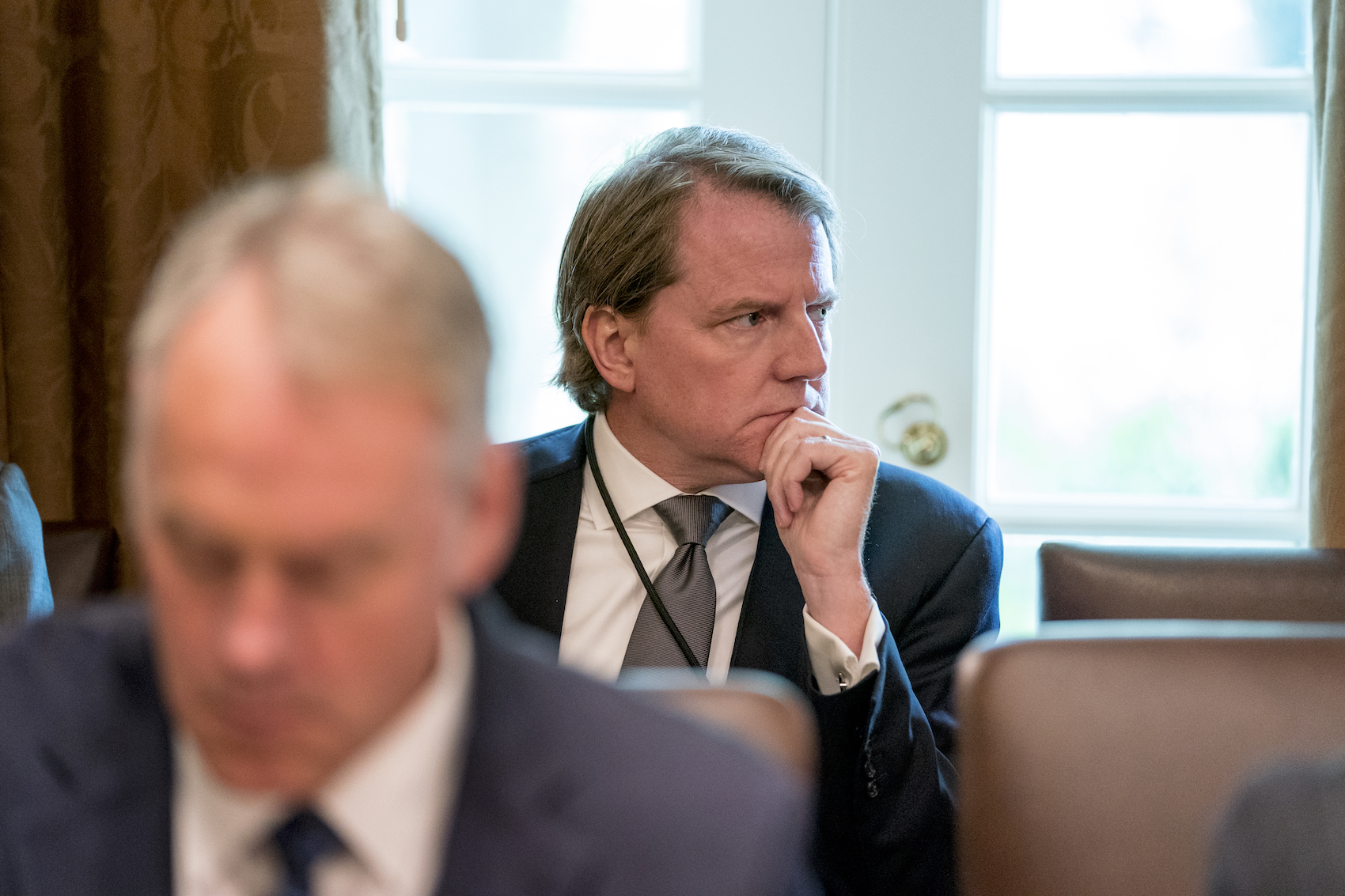 caption: White House counsel Donald McGahn attends a cabinet meeting in the Cabinet Room of the White House, Thursday, Aug. 16, 2018, in Washington. (Andrew Harnik/AP)
