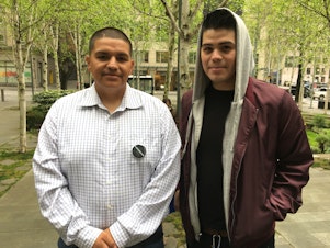 caption: Daniel Ramirez Medina (left) and his brother Tony Ramirez Medina outside of U.S. District Court in Seattle on May 1st, 2018.