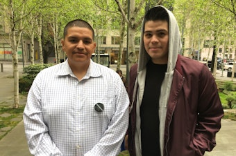 caption: Daniel Ramirez Medina (left) and his brother Tony Ramirez Medina outside of U.S. District Court in Seattle on May 1st, 2018.