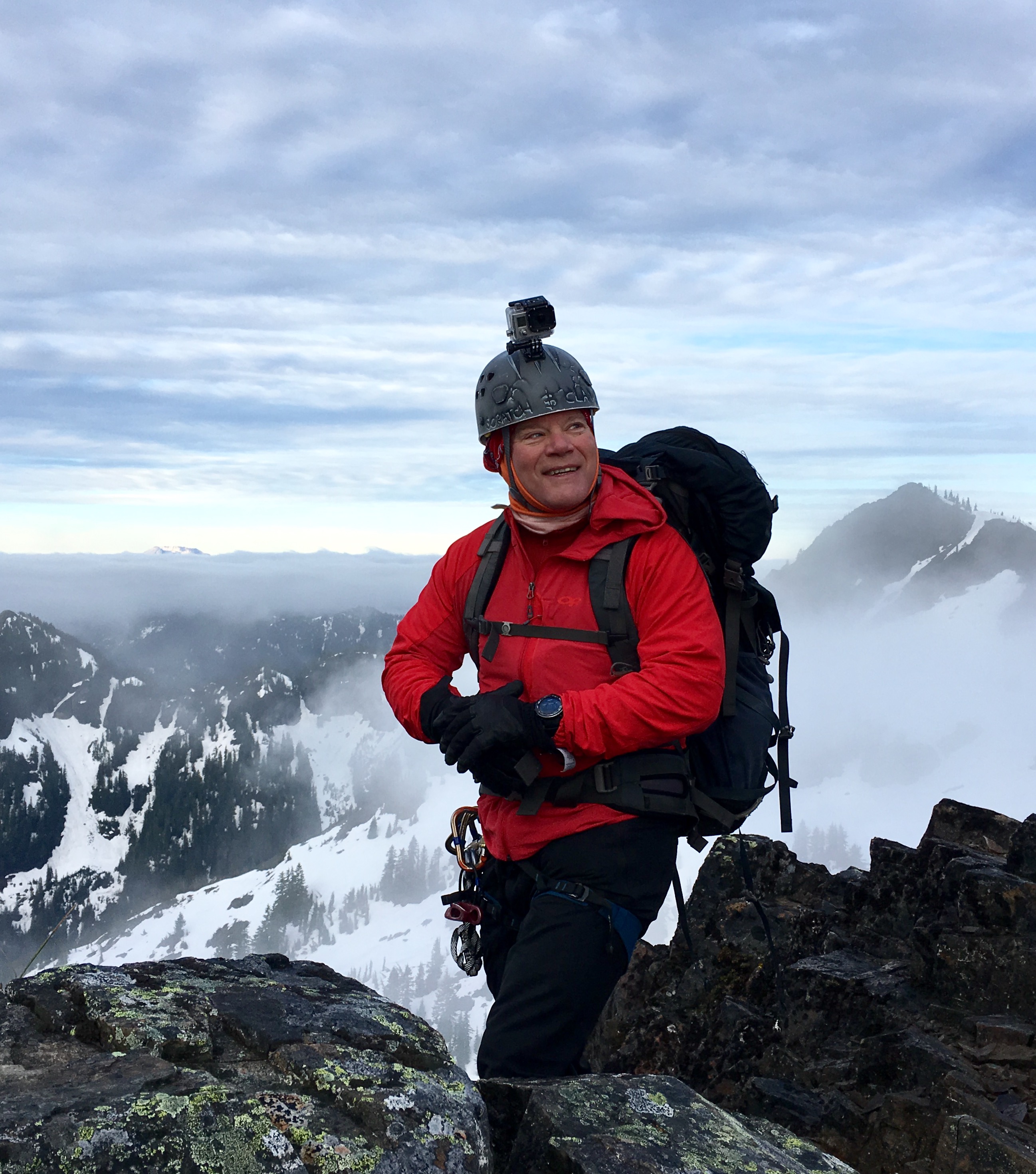 caption: Darrell Smart climbing in the Tatoosh Range in Mt. Rainier National Park. 