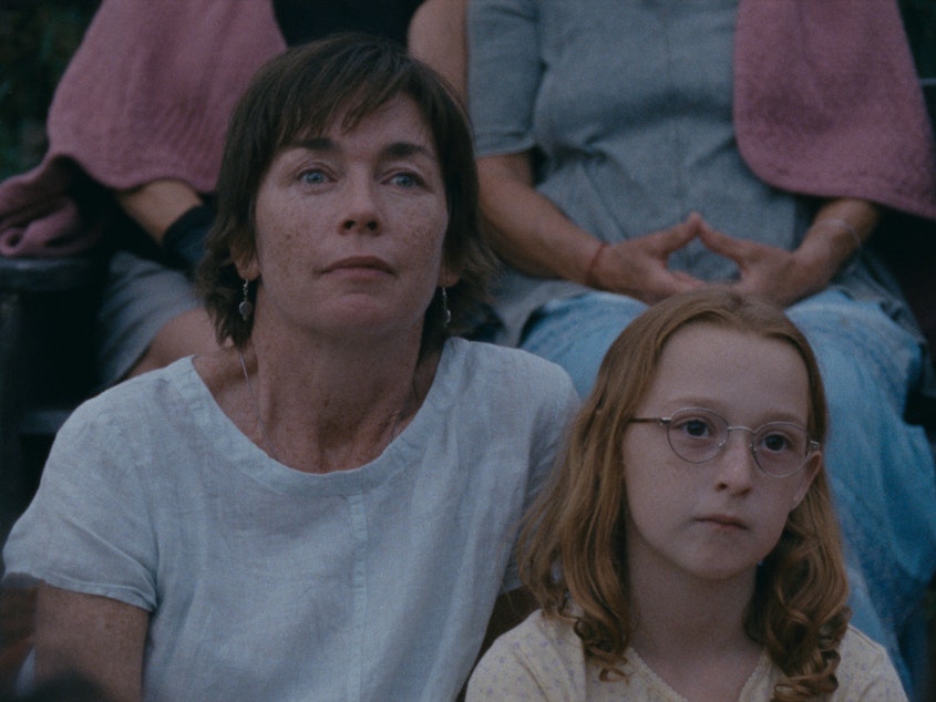 caption:  Mother and daughter Janet (Julianne Nicholson) and Lacy (Zoe Ziegler) share a slow New England summer in  <em>Janet Planet.</em>