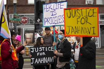 caption: Protesters gather for a rally in honor of Jaahnavi Kandula, who was killed by a Seattle Police Officer while crossing a street, on Saturday, September 23, 2023, at the intersection of 5th Avenue South and South Jackson Street in Seattle. 
