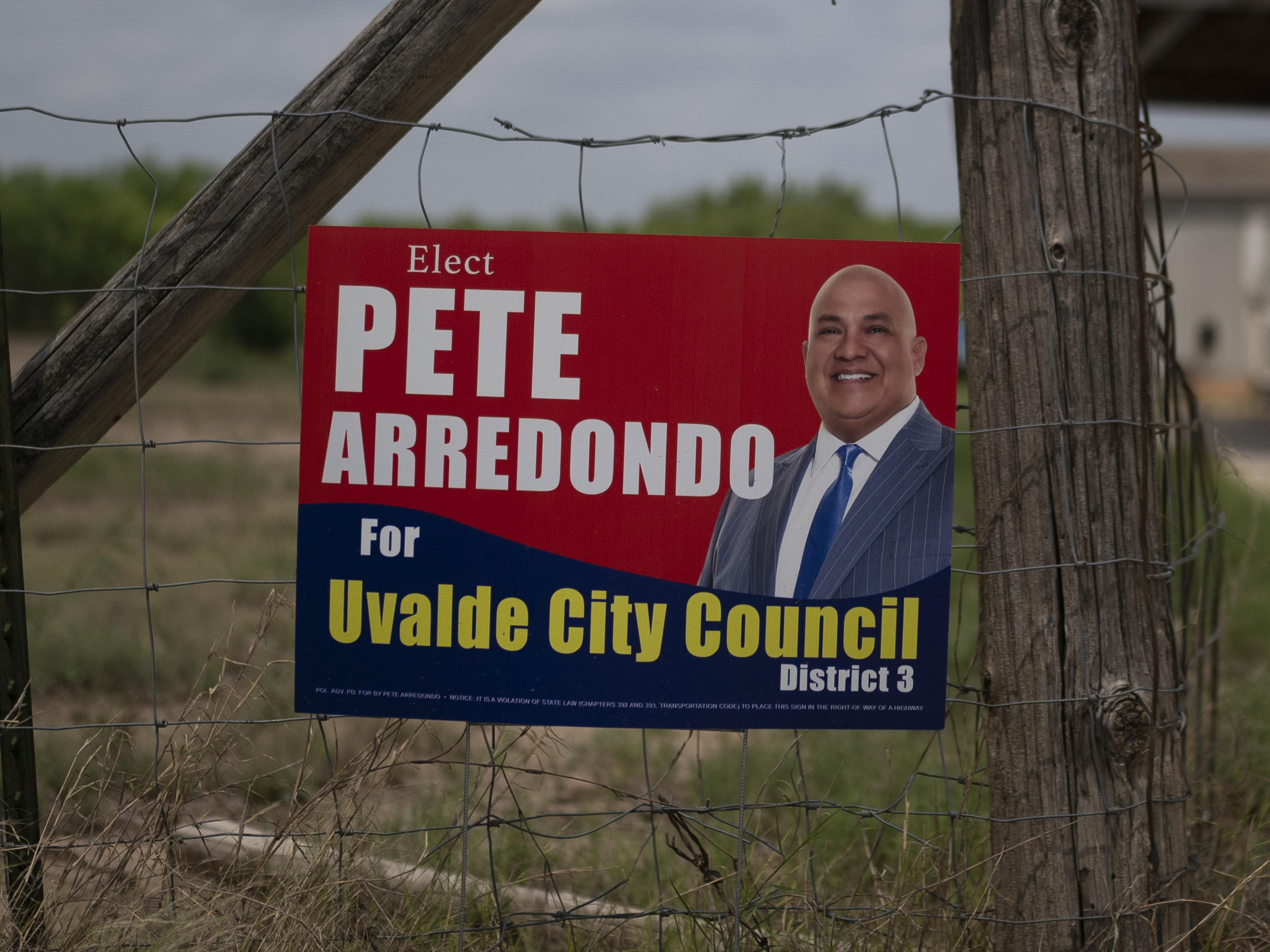 caption: A campaign sign for Pete Arredondo, the chief of police for the Uvalde Consolidated Independent School District, is seen in Uvalde, Texas, on Monday.