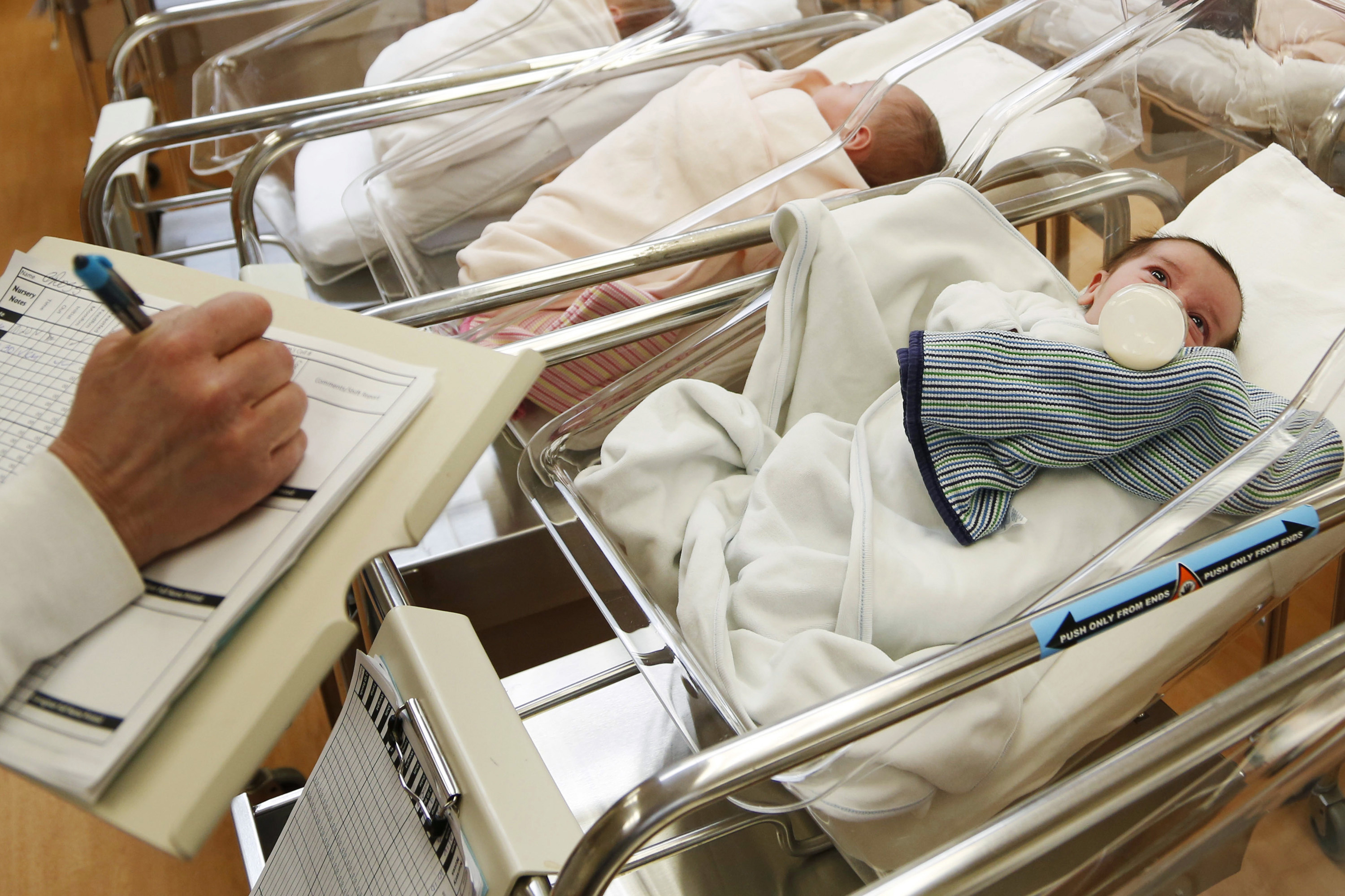 caption: Newborn babies in the nursery of a postpartum recovery center in upstate New York. (Seth Wenig/File/AP)