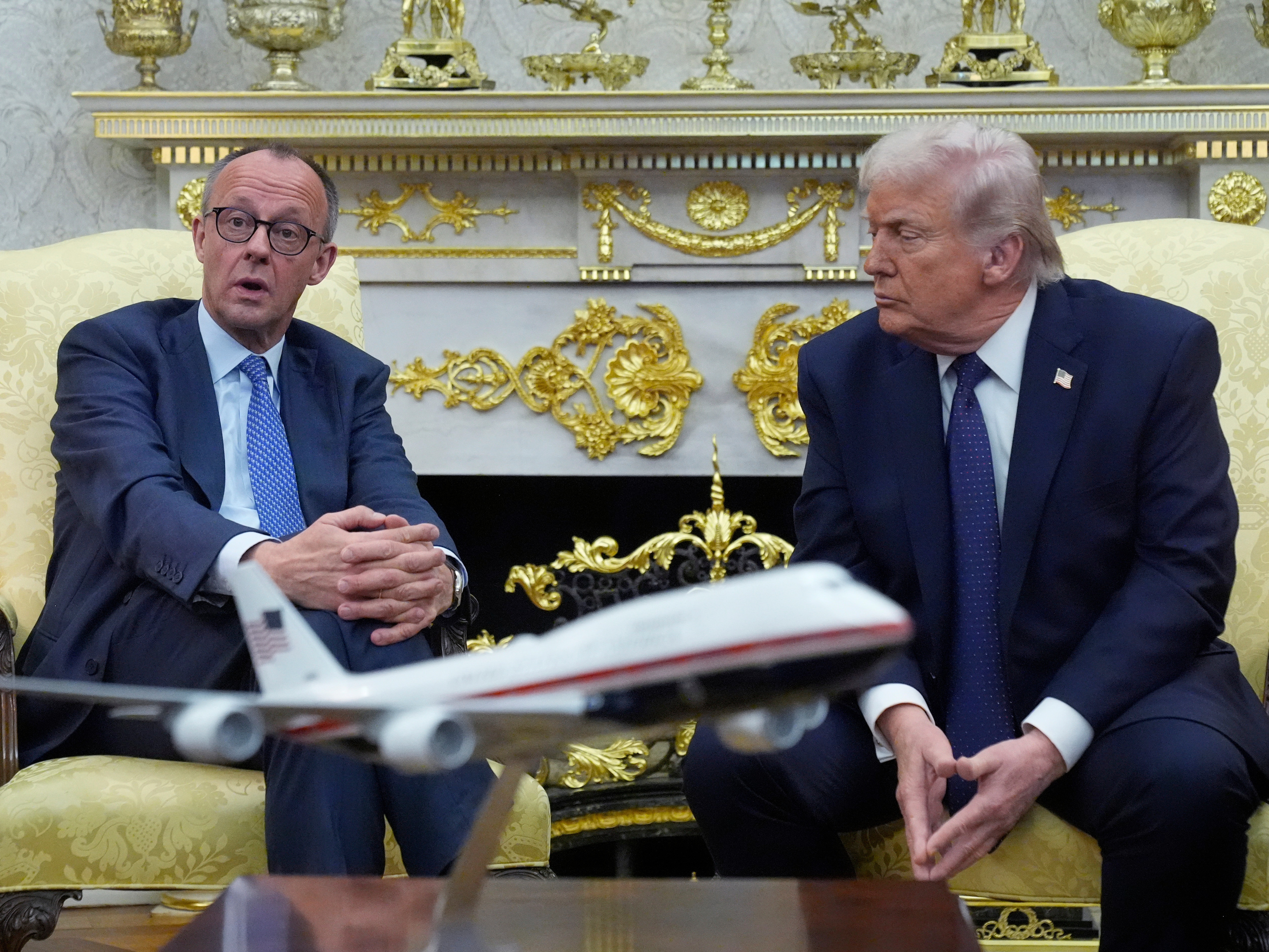 caption: FILE - President Donald Trump meets with German Chancellor Friedrich Merz in the Oval Office at the White House, March 3, 2026, in Washington.