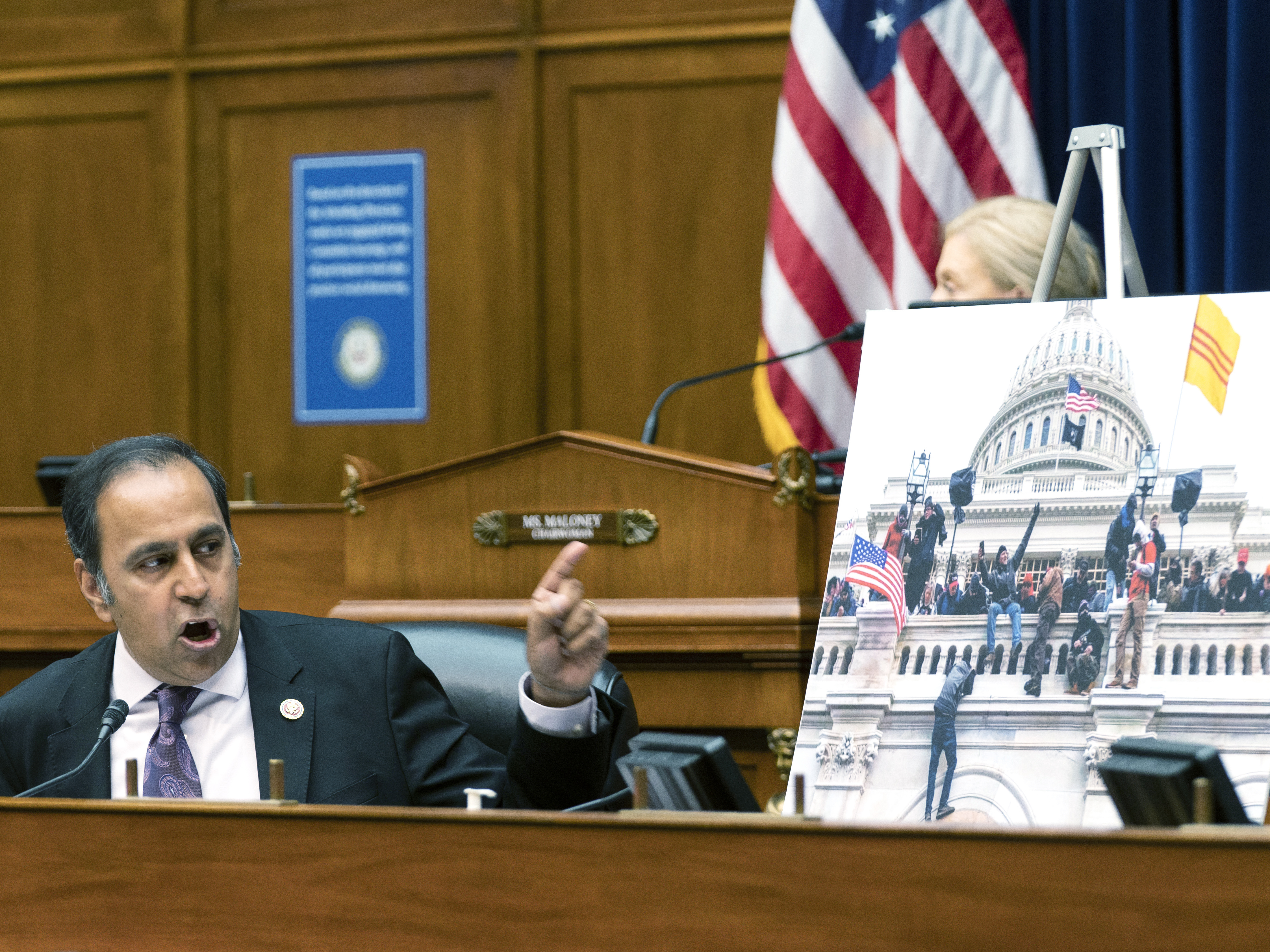 caption: Rep. Raja Krishnamoorthi, D-Ill., questions former acting Defense Secretary Christopher Miller during a hearing Wednesday on the U.S. Capitol breach. Miller testified remotely.