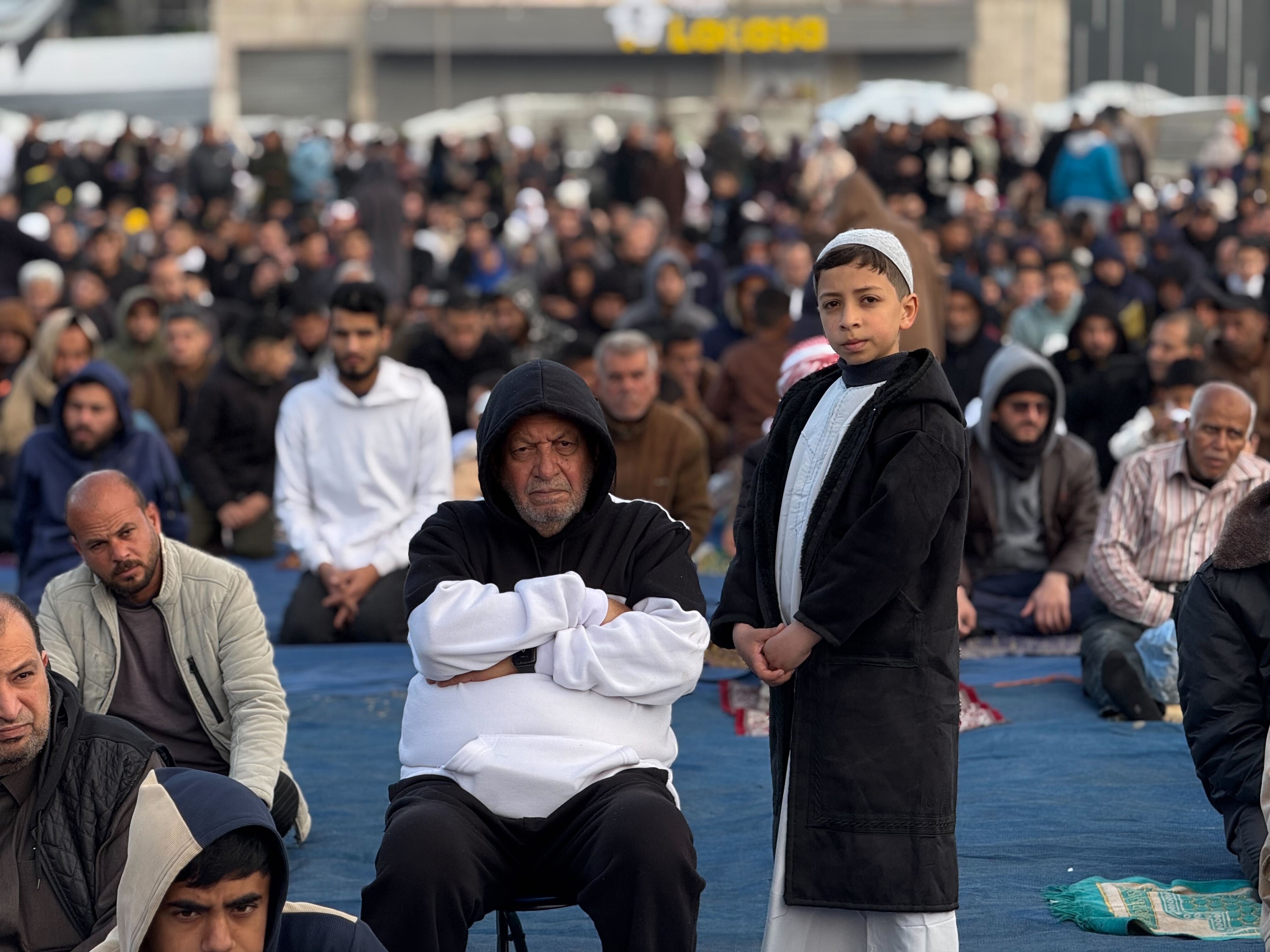 caption: Palestinians gather in Gaza City to mark the end of Ramadan, the Muslim month of fasting, with Eid prayers. Israeli airstrikes prevented such gatherings last year and the year before during the war on Hamas.