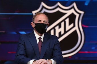 caption: NHL commissioner Gary Bettman prepares for the first round of the 2020 National Hockey League Draft at the NHL Network Studio on October 06, 2020 in Secaucus, New Jersey.