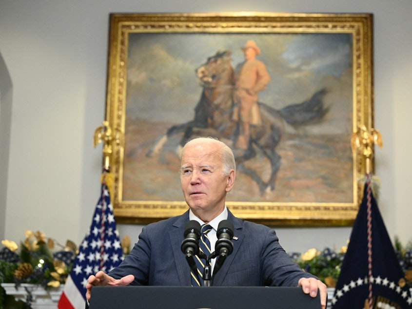 caption: President Joe Biden urged Congress to pass funding for Ukraine in the Roosevelt Room of the White House on Dec. 6, 2023.