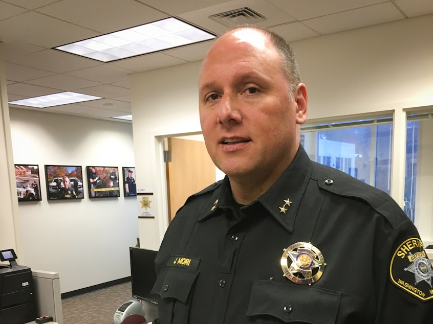 caption: Undersheriff Jeff Mori's agency in Oregon's Washington County has started allowing officers to have facial hair and tattoos. The agency is understaffed by about 55 people.
