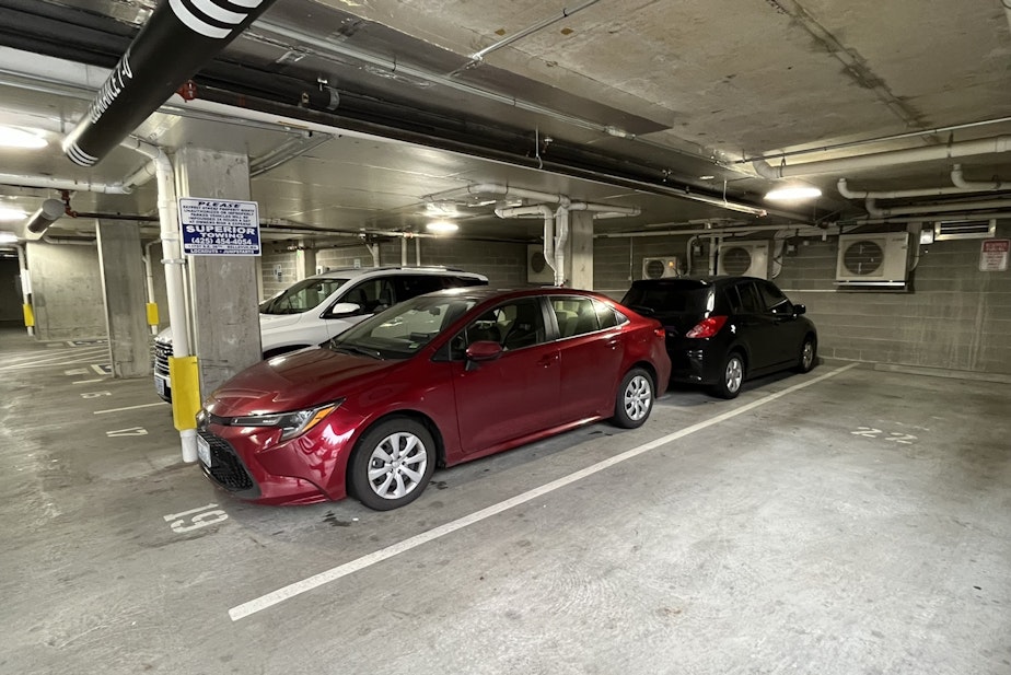 caption: Tandem parking stalls shared by two residents at the Arete apartments. The building includes far fewer parking stalls than one might expect in a standard Eastside apartment building.
