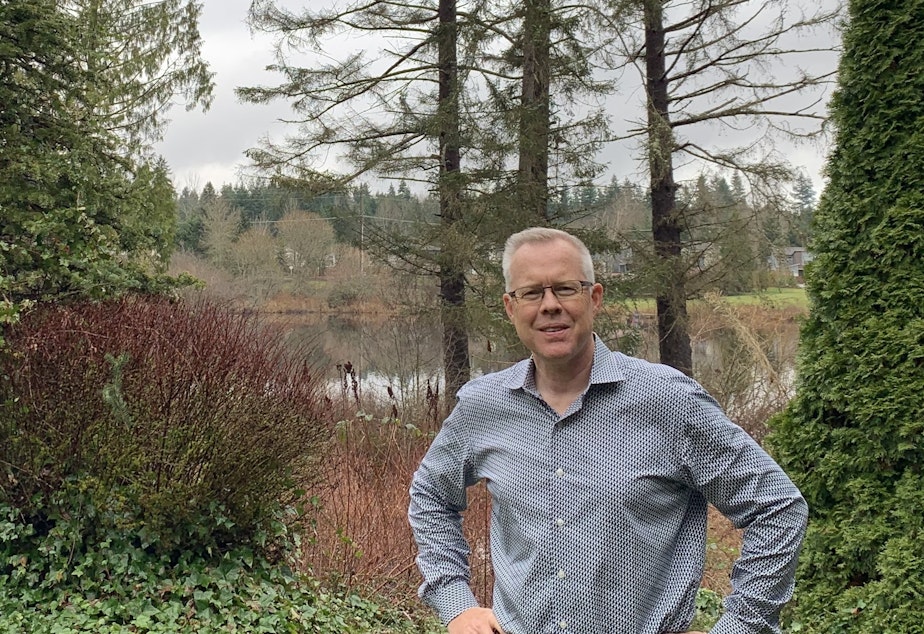 caption: Epik CEO Rob Monster standing in the backyard of his home in Sammamish, Wash.