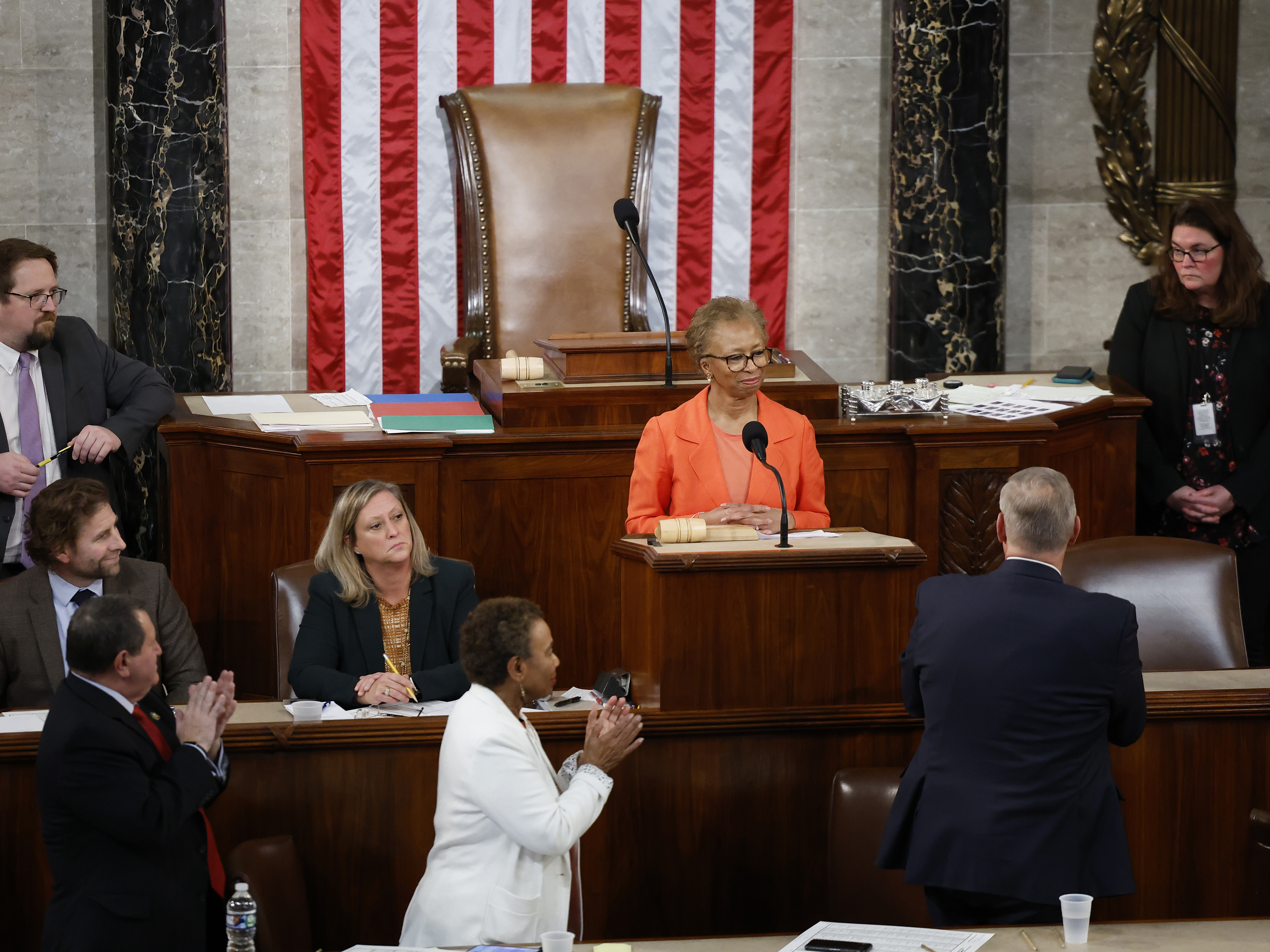 caption: House Clerk Cheryl Johnson receives a standing ovation in the House chamber on Thursday, the third day of speaker elections.