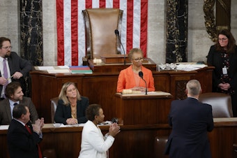 caption: House Clerk Cheryl Johnson receives a standing ovation in the House chamber on Thursday, the third day of speaker elections.