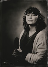 caption: A tintype photograph of producer Sarah Leibovitz
